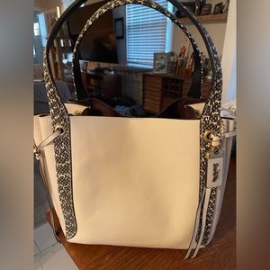 Coach purse with snake skin trim.  It’s a very soft off white.
